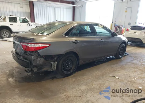 2016 Toyota Camry Le z USA, uszkodzony, nr VIN 4T4BF1FK6GR527874